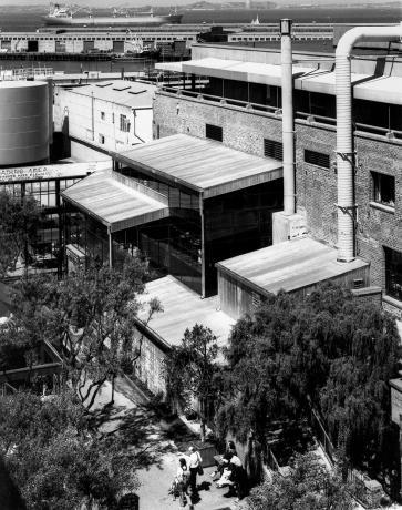 Exterior image of courtyard and restaurant addition