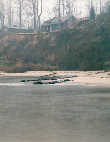 Photo of house from opposite bank